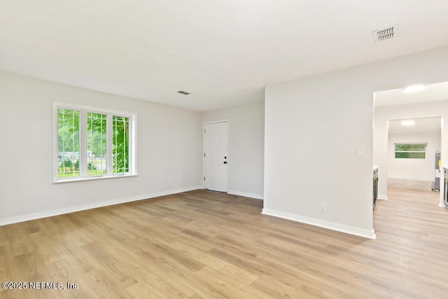 9340 Norfolk Blvd, Jacksonville, FL 32208 - empty room featuring light wood-style flooring and baseboards