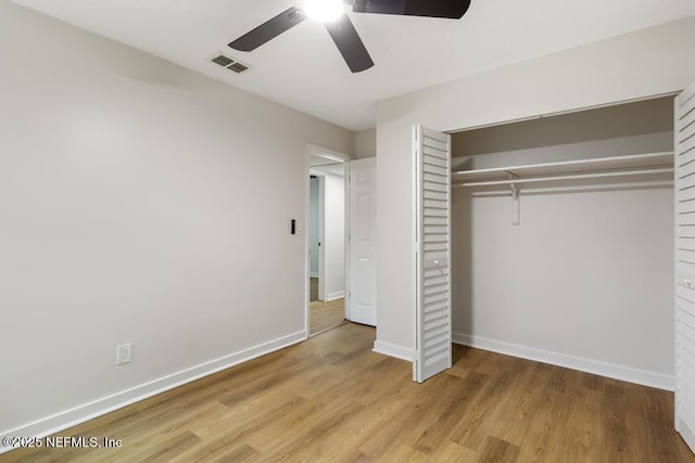 9340 Norfolk Blvd, Jacksonville, FL 32208 - unfurnished bedroom with light wood-style floors, a closet, and a ceiling fan