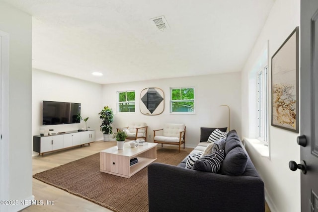9340 Norfolk Blvd, Jacksonville, FL 32208 - living area featuring wood finished floors and recessed lighting