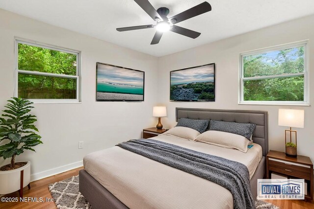 9340 Norfolk Blvd, Jacksonville, FL 32208 - bedroom with wood finished floors and a ceiling fan