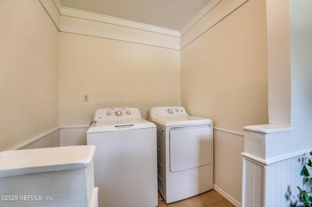 3516 Myra St, Jacksonville, FL 32205 - washroom with wainscoting, separate washer and dryer, and crown molding