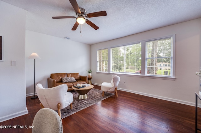 3516 Myra St, Jacksonville, FL 32205 - living area featuring wood finished floors, ceiling fan, and a textured ceiling