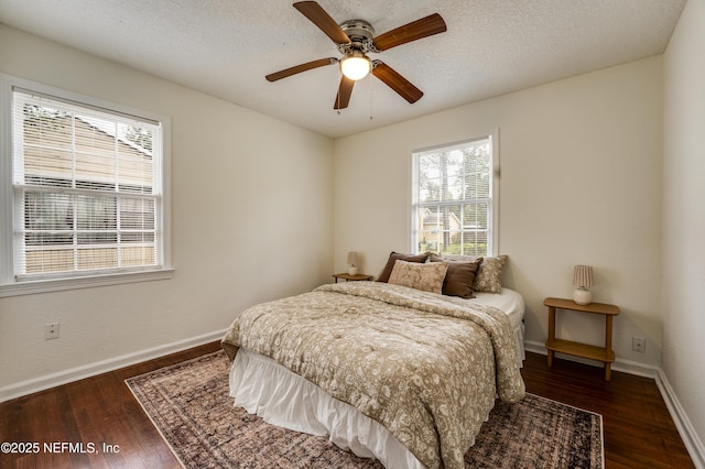 3516 Myra St, Jacksonville, FL 32205 - bedroom with multiple windows, wood finished floors, a textured ceiling, and a ceiling fan