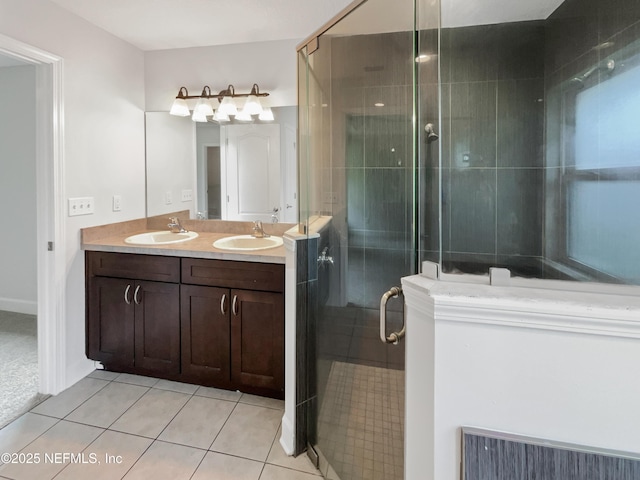 6191 Daylilly Rd, Macclenny, FL 32063 - full bathroom featuring tile patterned flooring, double vanity, and a stall shower