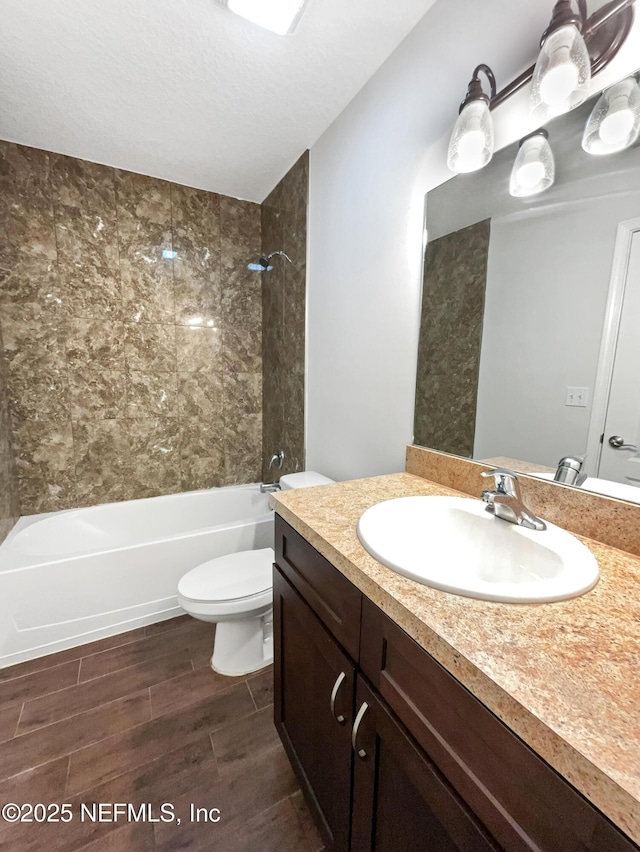 6191 Daylilly Rd, Macclenny, FL 32063 - bathroom featuring vanity, bathing tub / shower combination, and wood finished floors