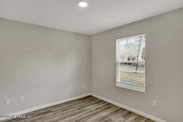 5050 San Juan Ave, Jacksonville, FL 32210 - unfurnished room with wood finished floors and recessed lighting