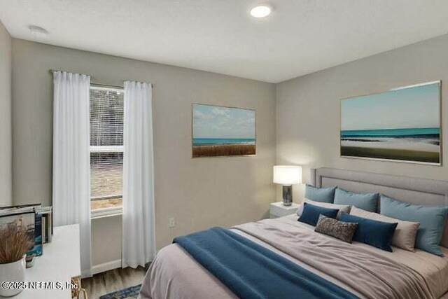 5050 San Juan Ave, Jacksonville, FL 32210 - bedroom with wood finished floors and recessed lighting