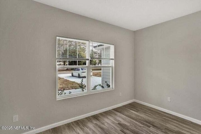 5050 San Juan Ave, Jacksonville, FL 32210 - unfurnished room featuring plenty of natural light and wood finished floors