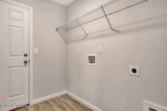 5050 San Juan Ave, Jacksonville, FL 32210 - laundry area featuring electric dryer hookup, hookup for a washing machine, and wood finished floors