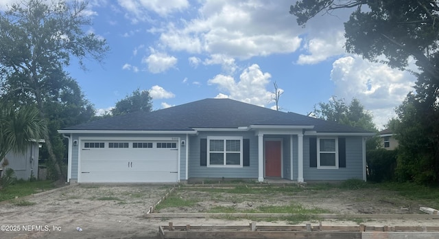 5050 San Juan Ave, Jacksonville, FL 32210 - ranch-style home featuring dirt driveway and an attached garage