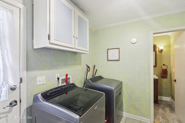 1071 Foxmeadow Trl, Middleburg, FL 32068 - laundry area featuring cabinet space, separate washer and dryer, and crown molding