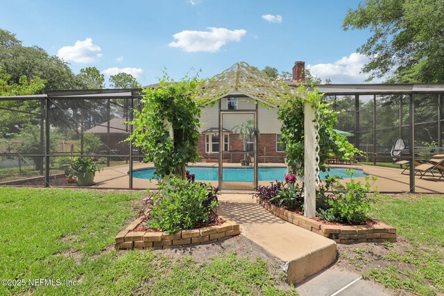 1071 Foxmeadow Trl, Middleburg, FL 32068 - swimming pool featuring a lawn, a lanai, and a patio