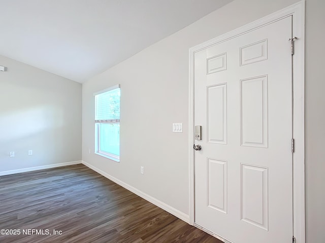 9473 N Athenia Dr, Citrus Springs, FL 34434 - entrance foyer featuring dark wood finished floors and baseboards