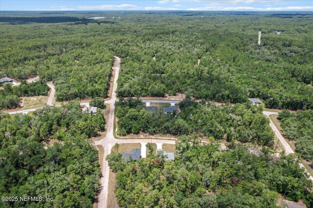 9473 N Athenia Dr, Citrus Springs, FL 34434 - aerial view of property and surrounding area with a heavily wooded area