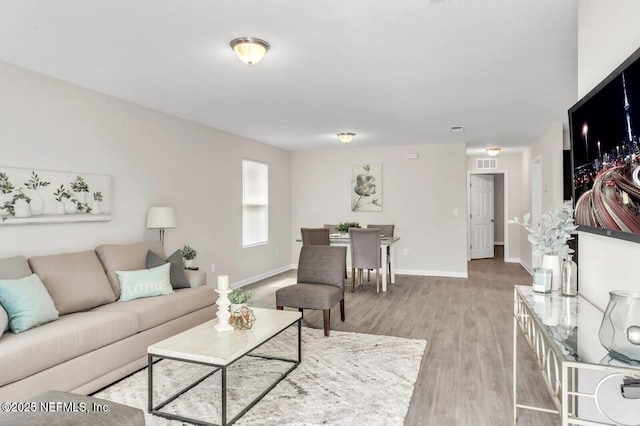 4730 Ridgewood Ave, Jacksonville, FL 32207 - living area featuring light wood-type flooring and baseboards
