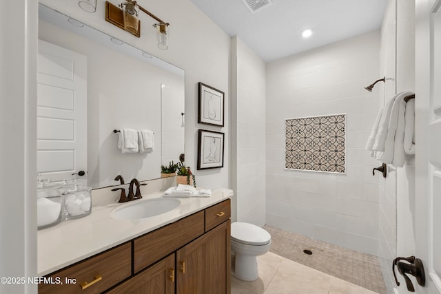 80 Oak Cluster Ln, Saint Augustine, FL 32092 - full bath featuring vanity, tiled shower, and tile patterned floors
