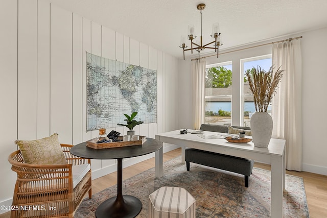 80 Oak Cluster Ln, Saint Augustine, FL 32092 - office space with a chandelier and light wood-style floors