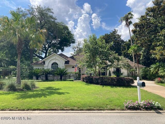 13464 Ellsworth Ln, Jacksonville, FL 32225 - view of front of home with a front yard and stucco siding