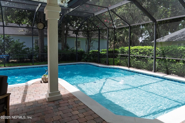 13464 Ellsworth Ln, Jacksonville, FL 32225 - outdoor pool featuring glass enclosure and a patio