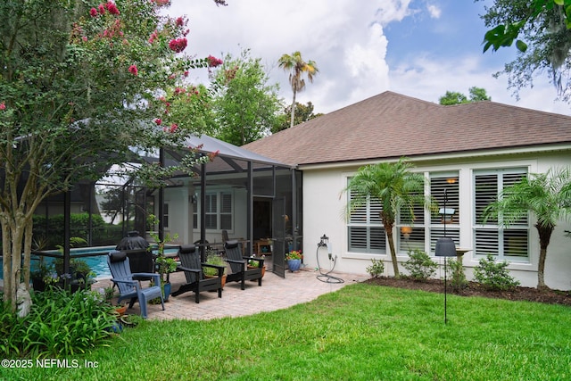 13464 Ellsworth Ln, Jacksonville, FL 32225 - rear view of property with stucco siding, a shingled roof, a patio area, a yard, and an outdoor pool
