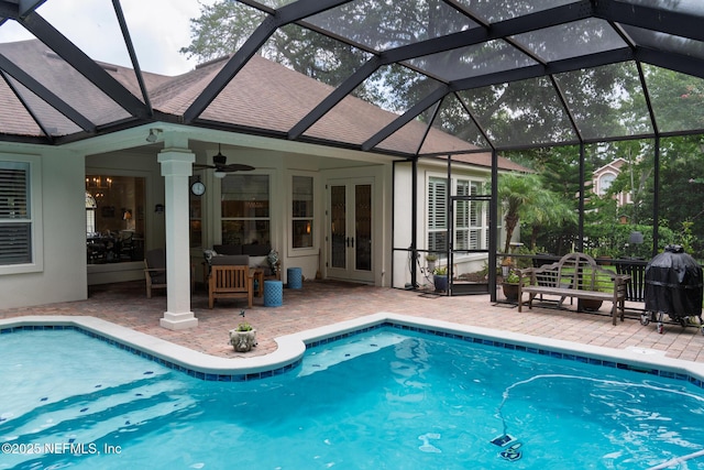 13464 Ellsworth Ln, Jacksonville, FL 32225 - swimming pool with french doors, a patio area, a lanai, and ceiling fan