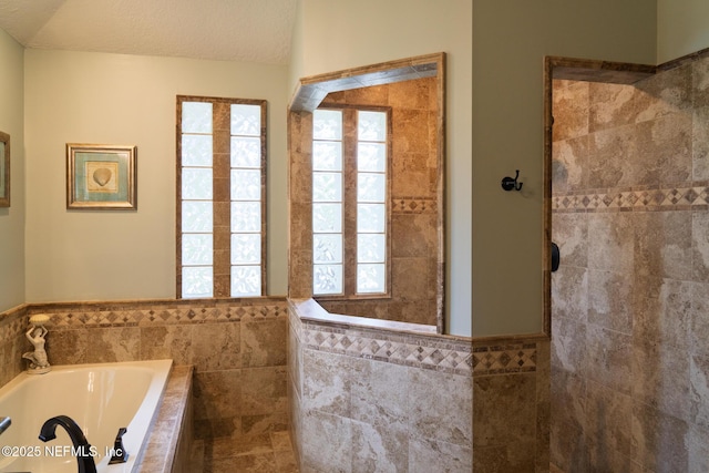 13464 Ellsworth Ln, Jacksonville, FL 32225 - bathroom featuring plenty of natural light, a tub with jets, a walk in shower, tile walls, and vaulted ceiling