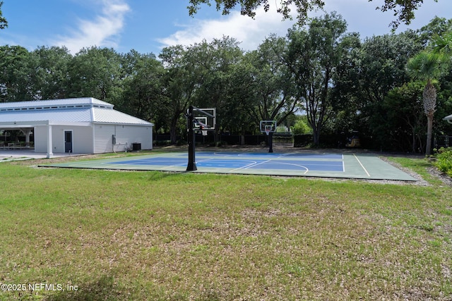 13464 Ellsworth Ln, Jacksonville, FL 32225 - view of basketball court featuring community basketball court, a lawn, and view of scattered trees