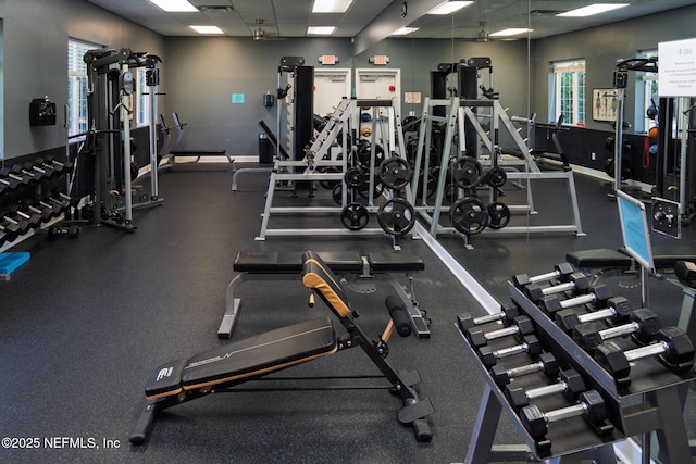 13464 Ellsworth Ln, Jacksonville, FL 32225 - exercise room with a drop ceiling and baseboards