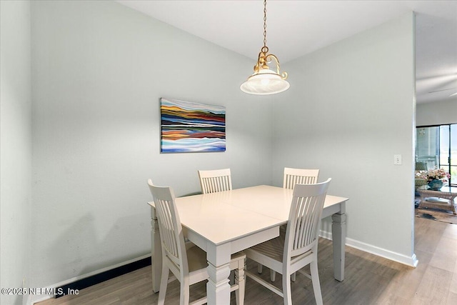 2404 Vista Cove Rd, Saint Augustine, FL 32084 - dining space with light wood-style flooring and baseboards