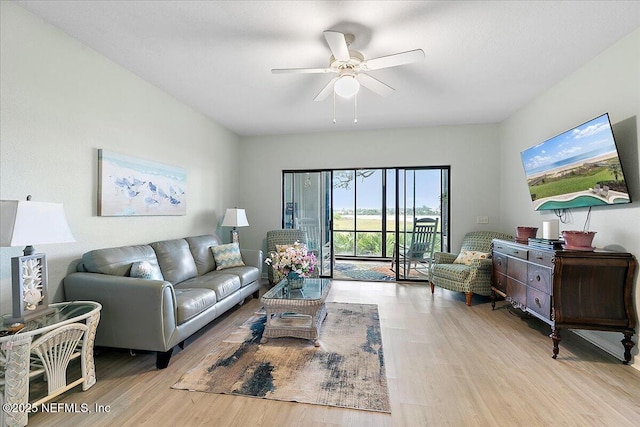 2404 Vista Cove Rd, Saint Augustine, FL 32084 - living area featuring wood finished floors and ceiling fan