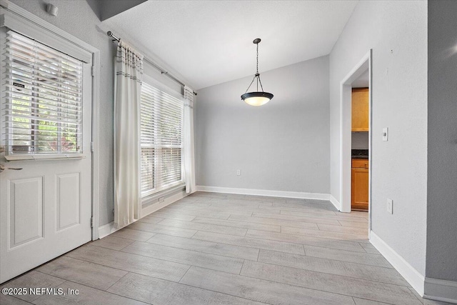 730 Tidewater Ct, Ponte Vedra Beach, FL 32082 - unfurnished dining area with light wood-type flooring and lofted ceiling