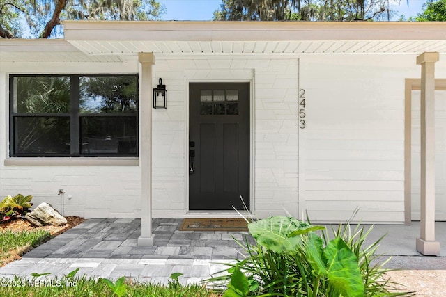 2453 Jetty Ct, Jacksonville, FL 32233 - entrance to property featuring concrete block siding
