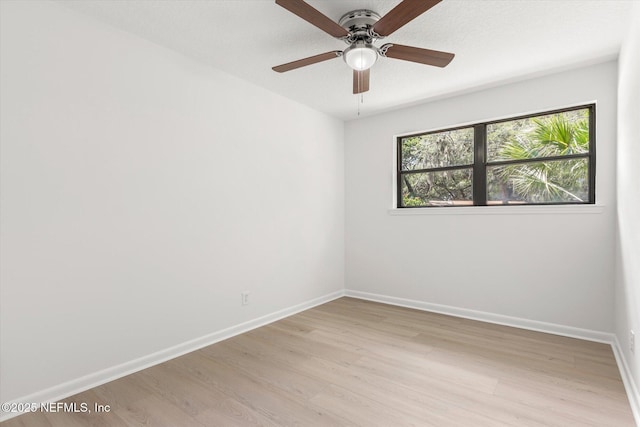 2453 Jetty Ct, Jacksonville, FL 32233 - spare room with light wood-style floors and ceiling fan