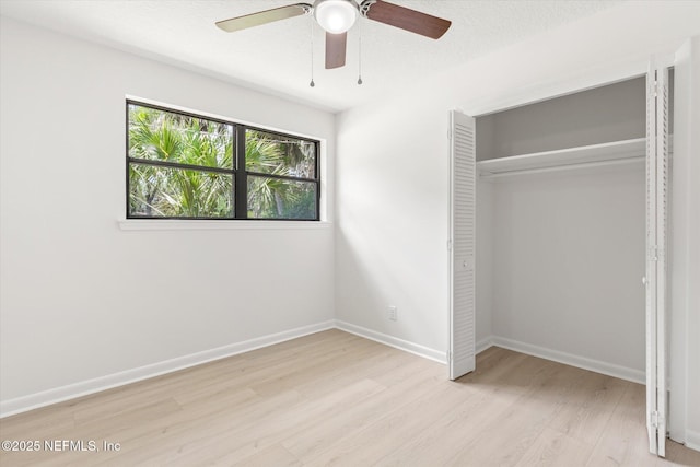 2453 Jetty Ct, Jacksonville, FL 32233 - unfurnished bedroom featuring light wood-style floors, a closet, and a ceiling fan