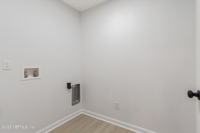 2453 Jetty Ct, Jacksonville, FL 32233 - laundry room with light wood-style floors and hookup for a washing machine