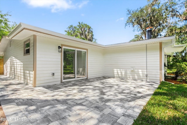 2453 Jetty Ct, Jacksonville, FL 32233 - rear view of property featuring a patio