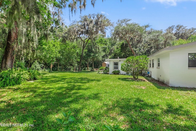 2453 Jetty Ct, Jacksonville, FL 32233 - view of grassy yard with view of scattered trees
