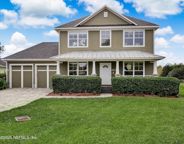 644 Sun Down Cir, Saint Augustine, FL 32080 - view of front of house with a garage, a porch, decorative driveway, a shingled roof, and a front yard