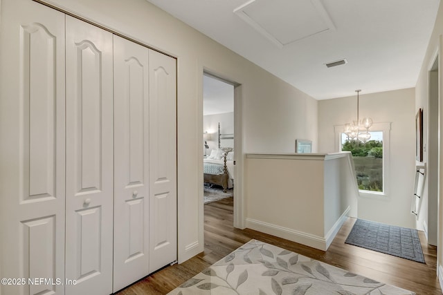 644 Sun Down Cir, Saint Augustine, FL 32080 - hall with wood finished floors and an upstairs landing