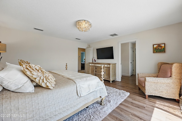 644 Sun Down Cir, Saint Augustine, FL 32080 - bedroom with light wood finished floors and baseboards