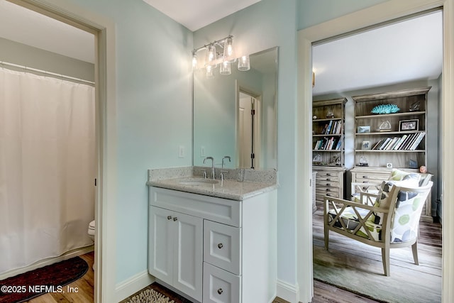 644 Sun Down Cir, Saint Augustine, FL 32080 - bathroom with vanity, wood finished floors, and curtained shower