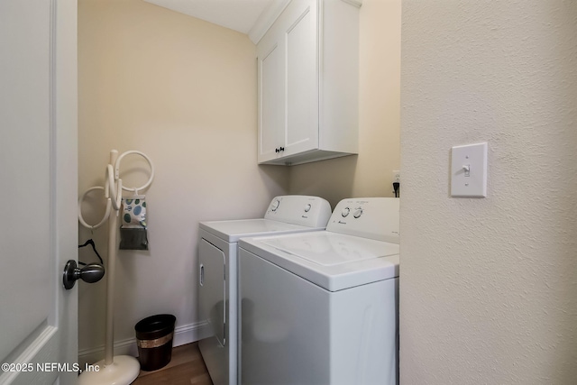 644 Sun Down Cir, Saint Augustine, FL 32080 - laundry room with independent washer and dryer, cabinet space, and wood finished floors