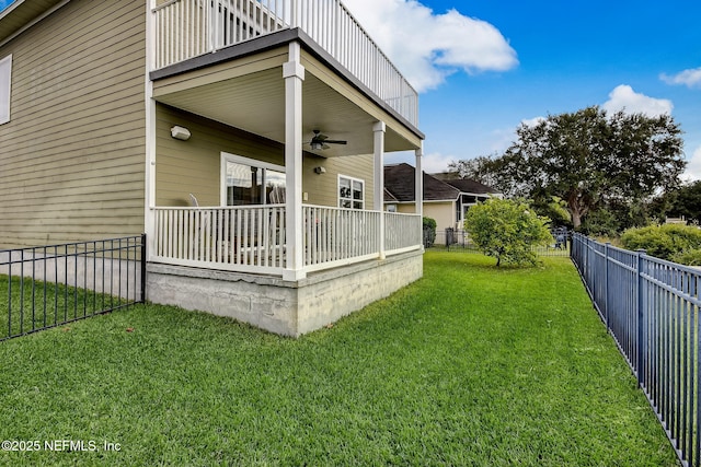 644 Sun Down Cir, Saint Augustine, FL 32080 - fenced backyard with a ceiling fan and a balcony