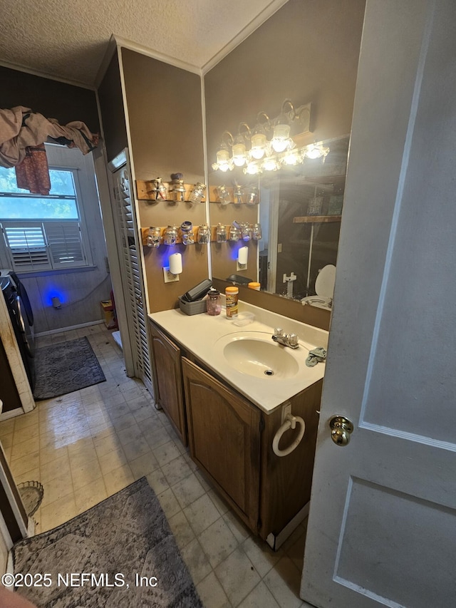 105 Owens Acres Dr, Macclenny, FL 32063 - bathroom featuring vanity, tile patterned floors, crown molding, and a textured ceiling