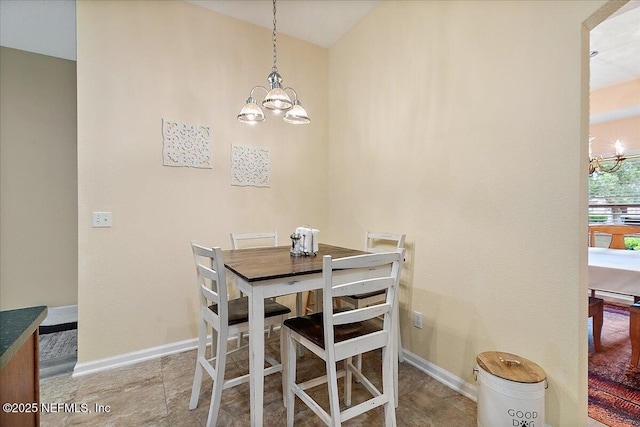 3504 Garibaldi Way, Saint Augustine, FL 32092 - dining space with a chandelier and lofted ceiling