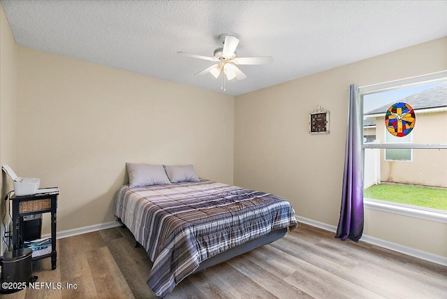 3504 Garibaldi Way, Saint Augustine, FL 32092 - bedroom with wood finished floors and ceiling fan