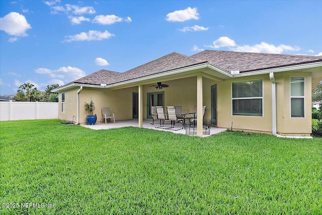 3504 Garibaldi Way, Saint Augustine, FL 32092 - rear view of property featuring a ceiling fan, a patio, stucco siding, and a shingled roof