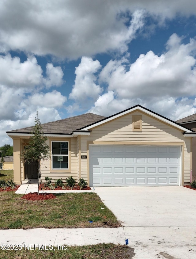 2915 Duck Hollow Ln, Green Cove Springs, FL 32043 - ranch-style house with an attached garage, concrete driveway, a shingled roof, and a front lawn