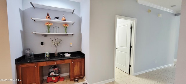 308 Winding Oak Way, Saint Augustine, FL 32084 - bar area with light tile patterned flooring and ornamental molding