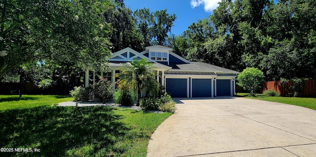 308 Winding Oak Way, Saint Augustine, FL 32084 - view of front of house featuring a garage and concrete driveway